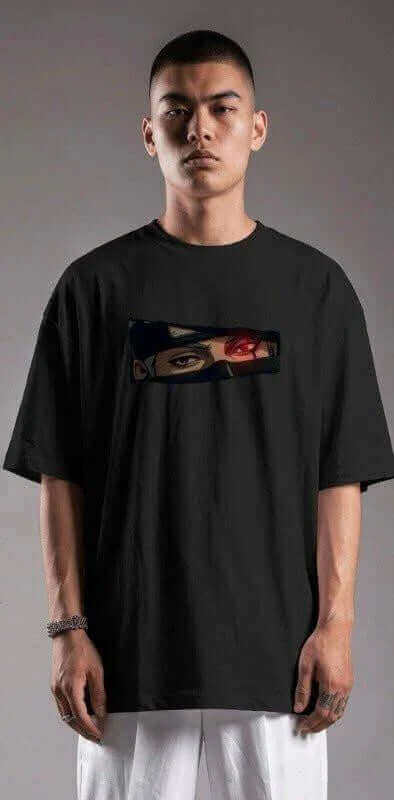 Oversized black anime T-shirt with Sharingan eye graphic, worn by male model