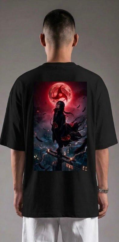 Oversized black T-shirt with anime graphic and red moon on the back, worn by a man.